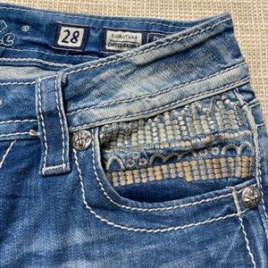 Miss Me jeans, low rise, straight leg, hem embroidery. Size 28